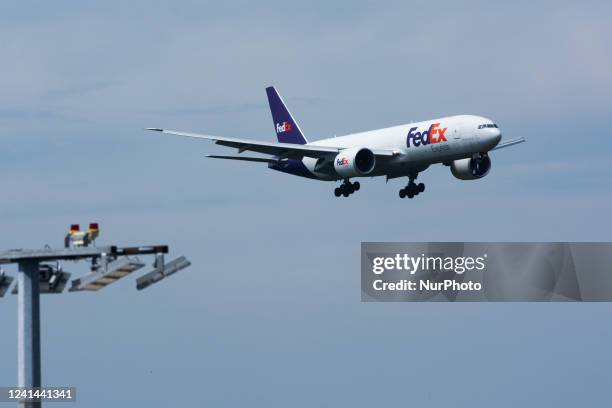 A Fedex aircarft is seen arriving at Cologne &amp; Bonn airport in Cologne, Germany on June 21, 2022 as airline is dealing with staff shortages...