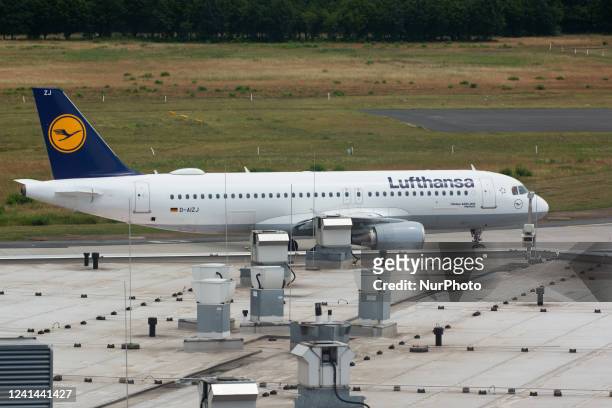 A Lufthansa airplane is seen on the runway at Cologne &amp; Bonn airport in Cologne, Germany on June 21, 2022 as airline is dealing with staff...
