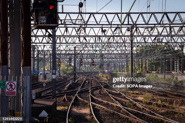 All signals are on red leaving empty tracks out of Piccadilly train station. The biggest rail strike in over 30 years went ahead after last-minute...