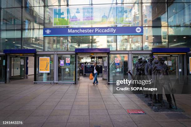 Lone commuter exists Piccadilly train station. The biggest rail strike in over 30 years went ahead after last-minute talks failed. RMT states it has...