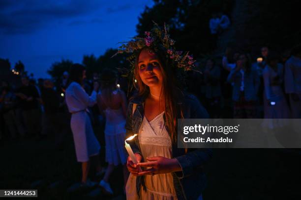 People gather to celebrate the Summer Solstice in Krakow, Poland on June 21, 2022. The summer Solstice represents the longest day of the year and it...
