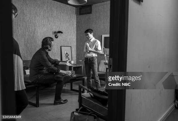 Episode 1310 -- Pictured: Host Seth Meyers talks with Actor Elliot Page backstage on June 21, 2022 --