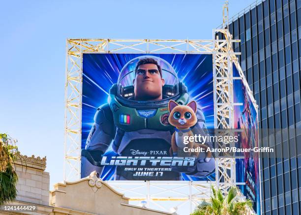 General view of a billboard above the El Capitan Entertainment Centre promoting the Disney Pixar movie 'Lightyear' on June 21, 2022 in Hollywood,...