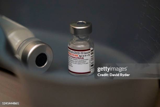 Vial of the Pfizer Covid-19 vaccine, labeled for ages 2 to 5 during research but still acceptable for children below age 2, is seen at UW Medical...