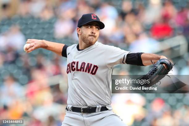 Aaron Civale of the Cleveland Guardians delivers a pitch against the Minnesota Twins in the first inning at Target Field on June 21, 2022 in...