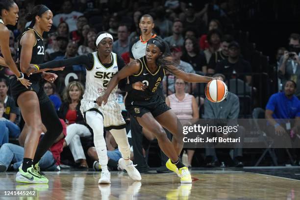 Jackie Young of the Las Vegas Aces handles the ball during the game against the Chicago Sky on June 21, 2022 at Michelob ULTRA Arena in Las Vegas,...