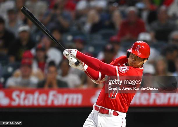 Shohei Ohtani of the Los Angeles Angels hits a 3-run home run in the sixth inning of the game against the Kansas City Royals at Angel Stadium of...