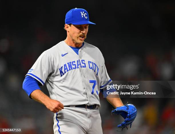 Daniel Mengden of the Kansas City Royals celebrates after earning a save in the 11th inning of the game against the Los Angeles Angels at Angel...