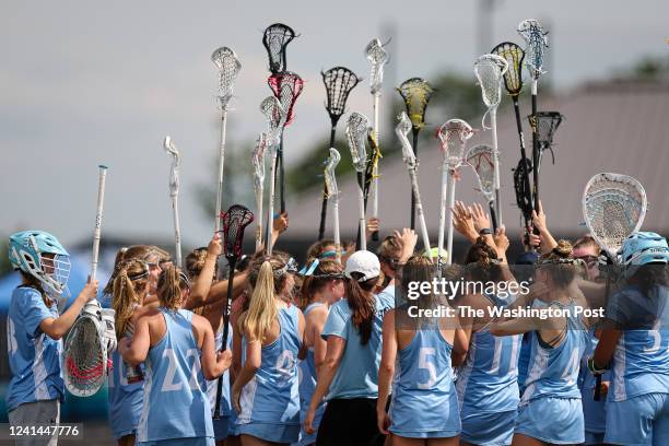Yorktown Patriots huddle during the second half of the Virginia class 6 girls lacrosse state championship game against the Battlefield Bobcats at...