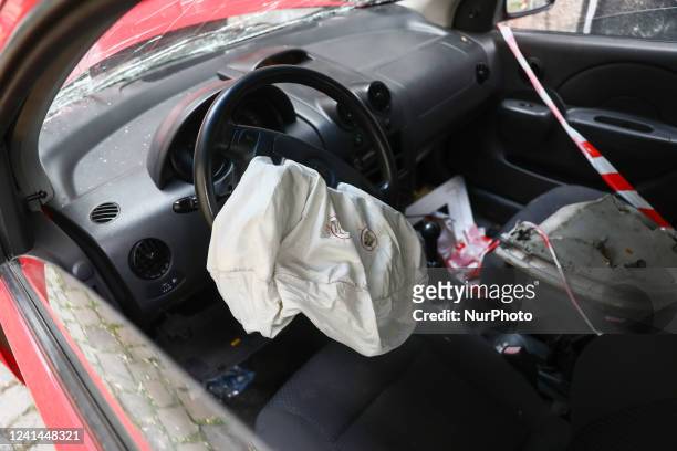 An deployed airbag is seen in a damaged car parked in Krakow, Poland on June 21, 2022.