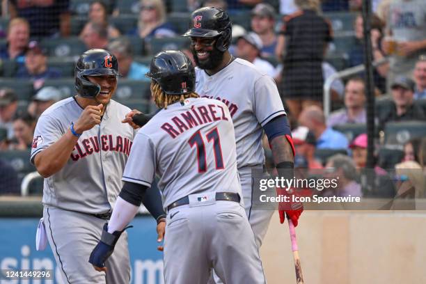 Cleveland Guardians infielder Josh Naylor celebrates his two-run home run with Cleveland Guardians designated hitter Franmil Reyes and Cleveland...