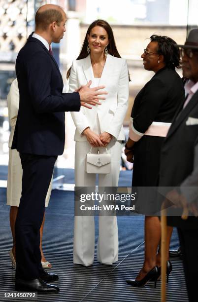 Prince William, Duke of Cambridge and Catherine, Duchess of Cambridge attend the unveiling of the National Windrush Monument at Waterloo Station on...