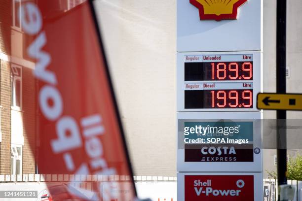 The price board at a Shell Gas Station displays the unit prices of different fuels in London. Fuel prices have been rising since last summer due to...