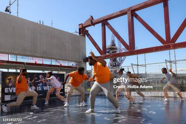 Hip Hop group EASTablishment perform during a topping out ceremony at Sadlers Wells East, Olympic Park on June 22, 2022 in London, England. Sadler's...