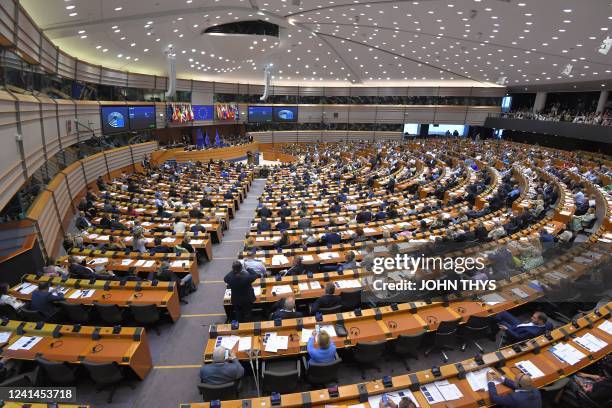 Euro-deputies take part in a vote on the revision of the EU emissions trading system at the European Union Parliament in Brussels on June 22, 2022.