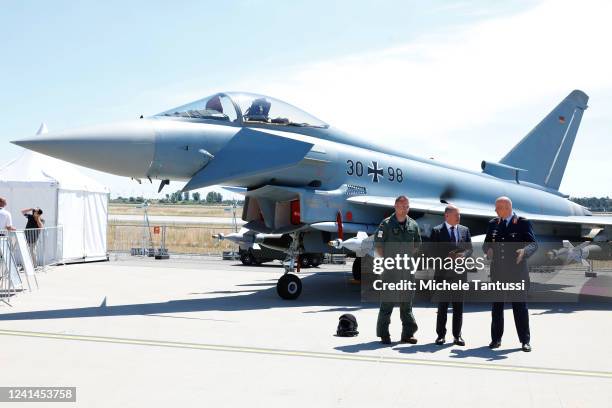 German Chancellor, Olaf Scholz General Ingo Gerhartz and Major Stefan Schneemilch in front of an Eurofighter Aircraft on the first day of the ILA...