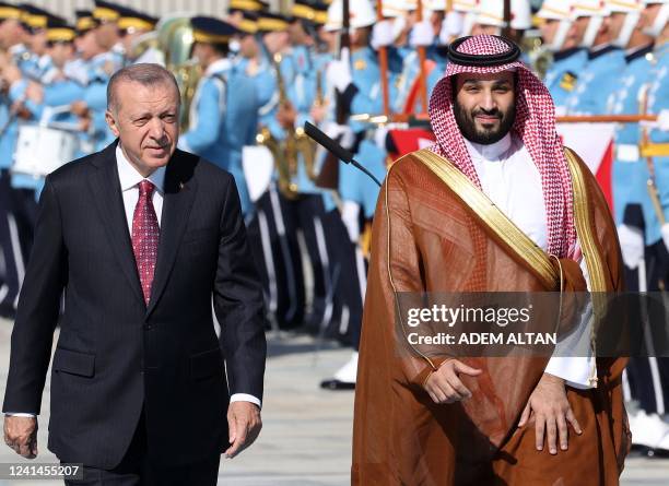 Turkey's President Recep Tayyip Erdogan welcomes Crown Prince of Saudi Arabia Mohammed bin Salman during an official ceremony at the Presidential...