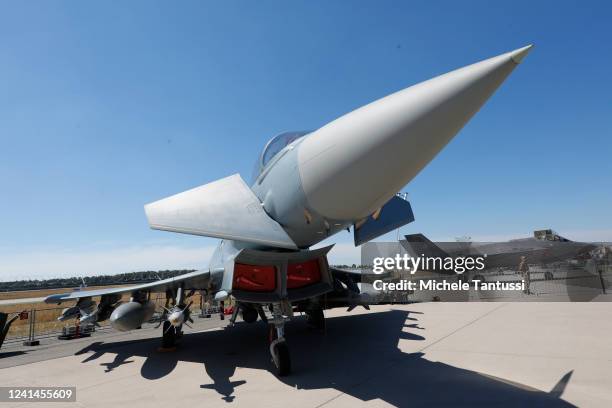 An Eurofighter and a F35 aircrafts stands on display on the first day of the ILA Berlin 2022 air show on June 22, 2022 in Schoenefeld, Germany. This...