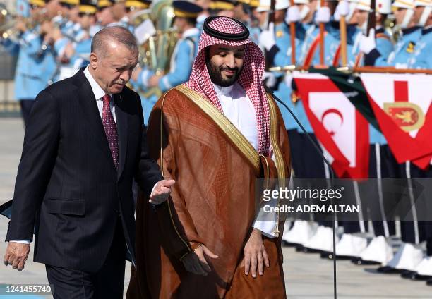 Turkey's President Recep Tayyip Erdogan gestures as he welcomes Crown Prince of Saudi Arabia Mohammed bin Salman during an official ceremony at the...