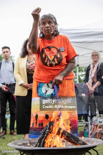 An Indigenous elder starts the ceremonial fire to celebrate the summer solstice. During this summer solstice, Canadians celebrated the 26th National...