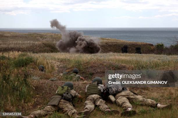 Servicemen of the 126th Separate Territorial Brigade of the Armed Forces of Ukraine take part in military exercises in Odessa region on June 22 amid...