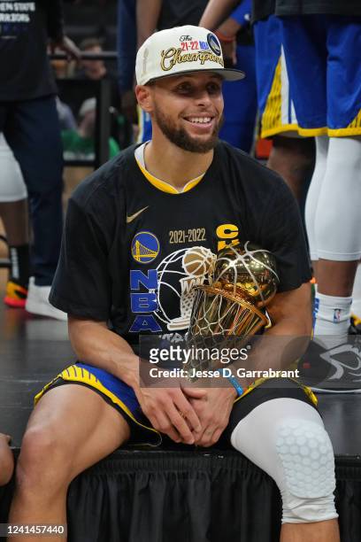Stephen Curry of the Golden State Warriors holds the Bill Russell NBA Finals MVP Award after Game Six of the 2022 NBA Finals on June 16, 2022 at TD...