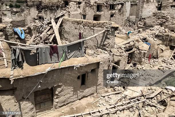 Damaged houses are pictured following an earthquake in Gayan district, Paktika province on June 22, 2022. The 5.9-magnitude quake, which killed at...