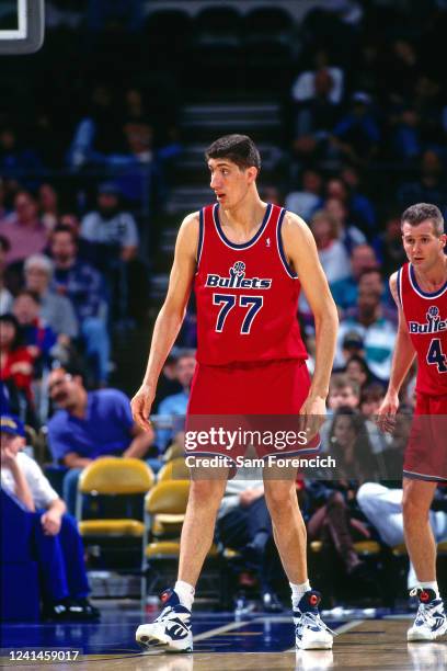 Gheorge Muresan of the Washington Bullets looks on during a game against the Golden State Warriors in 1992 at The Oakland-Alameda County Coliseum...