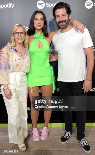 Spotify CCO Dawn Ostroff, Dua Lipa and Spotify Global Head of Music Jeremy Erlich pose backstage as Spotify hosts an evening of music with...