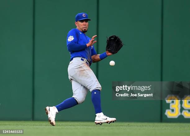 Rafael Ortega of the Chicago Cubs fields a ball hit by Michael Perez of the Pittsburgh Pirates during the fourth inning at PNC Park on June 22, 2022...