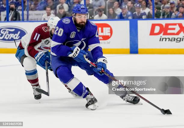 Tampa Bay Lightning left wing Nicholas Paul clears the puck during the NHL Hockey Stanley Cup Finals Game 4 between Tampa Bay Lightning and the...