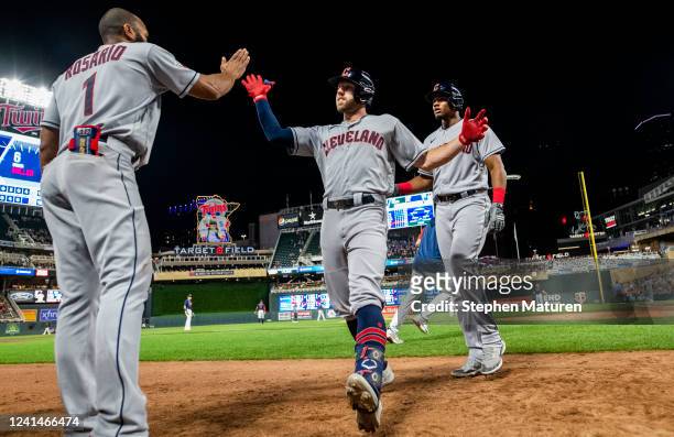 Owen Miller of the Cleveland Guardians celebrates after hitting a sacrifice fly to take the lead in the ninth inning of the game against the...