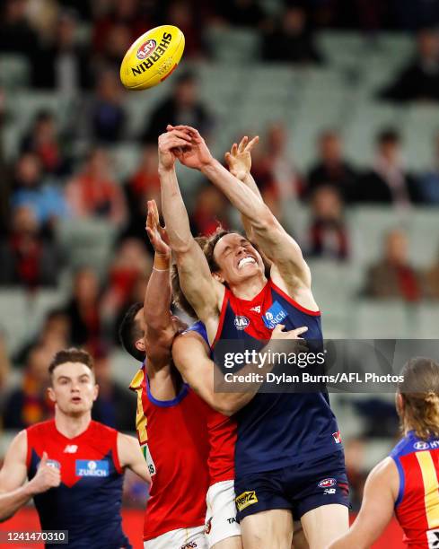 Ben Brown of the Demons attempts to take a contested mark during the 2022 AFL Round 15 match between the Melbourne Demons and the Brisbane Lions at...