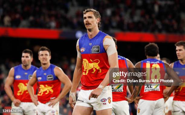 Joe Daniher of the Lions looks dejected after a loss during the 2022 AFL Round 15 match between the Melbourne Demons and the Brisbane Lions at the...