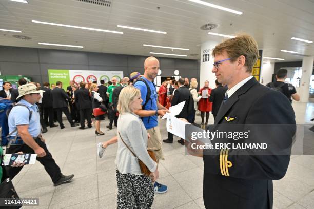 Illustration shows workers on strike and travelers in the departure hall of Brussels Airport, in Zaventem, Thursday 23 June 2022. Pilots and cabin...