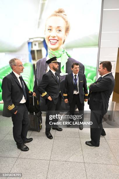 Illustration shows workers on strike in the departure hall of Brussels Airport, in Zaventem, Thursday 23 June 2022. Pilots and cabin crew members of...