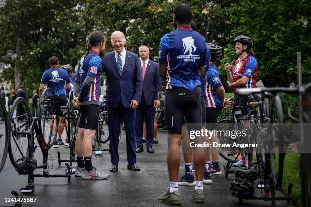 President Joe Biden meets with members of the Wounded Warrior Project's Soldier Ride, on the South Lawn at the White House June 23, 2022 in...