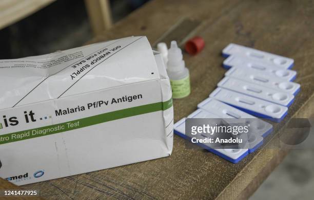 Health worker tests malaria of Flood affected people staying in temporary relief camp, at a village on June 23, 2022 in Barpeta, India. Assam flood...