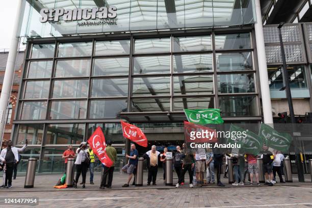 Union members join the picket line outside St Pancras International station on the second day of the biggest national rail strike in Britain in 30...