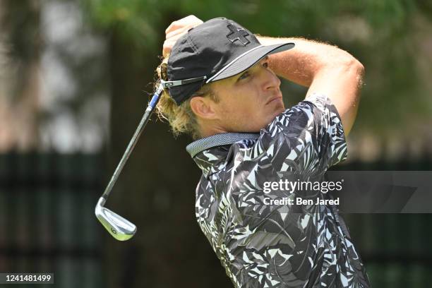 Morgan Hoffmann plays a tee shot on the 17th hole during the first round of the Travelers Championship at TPC River Highlands on June 23, 2022 in...