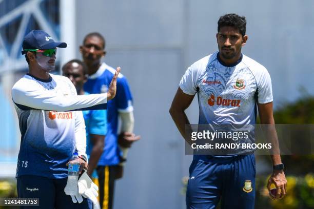 Shakib Al Hasan and Syed Khaled Ahmed of Bangladesh take part in a training session one day ahead of the 2nd Test between Bangladesh and West Indies...