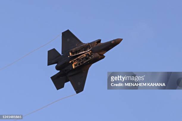 Israel's F-35 Lightning II fighter jet takes part in an aerial display during a graduation ceremony of Israeli Air Force pilots at the Hatzerim base...
