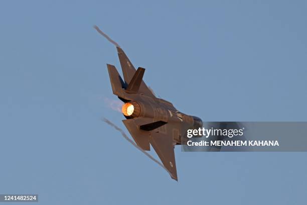 Israel's F-35 Lightning II fighter jet takes part in an aerial display during a graduation ceremony of Israeli Air Force pilots at the Hatzerim base...