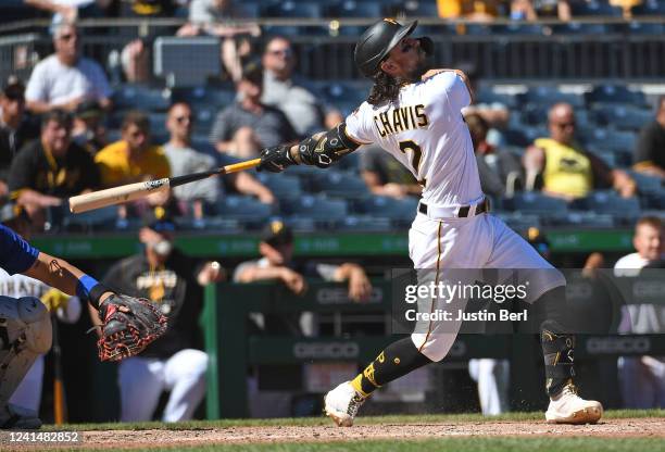 Michael Chavis of the Pittsburgh Pirates hits a walk-off RBI single to give the Pirates a 8-7 win over the Chicago Cubs in ten innings during the...