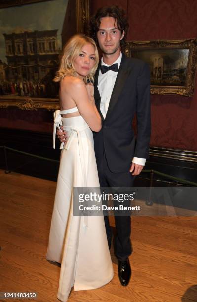 Sienna Miller and Oli Green attend 'The Alchemist's Feast', the inaugural summer party & fundraiser for the National Gallery's Bicentenary campaign,...