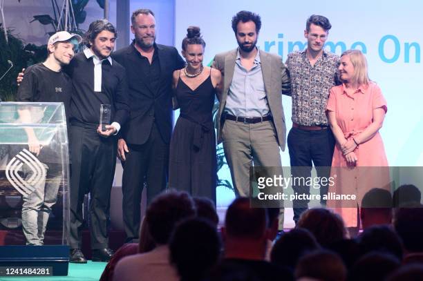 June 2022, North Rhine-Westphalia, Cologne: Youtuber Rezo stands on stage at the Grimme Online Awards ceremony with the winners of an award in the...