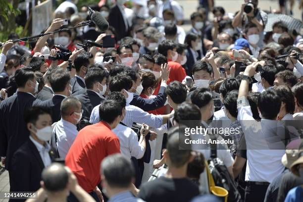 Fumio Kishida , Prime Minister of Japan and President of the Liberal Democratic Party , surrounded by body guard meets supporter after his speech...