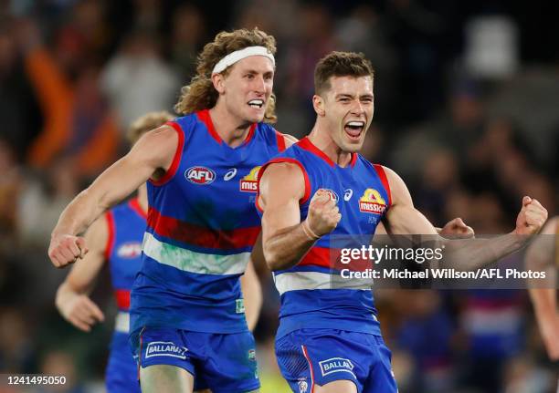 Josh Dunkley of the Bulldogs celebrates a goal during the 2022 AFL Round 15 match between the Western Bulldogs and the Hawthorn Hawks at Marvel...