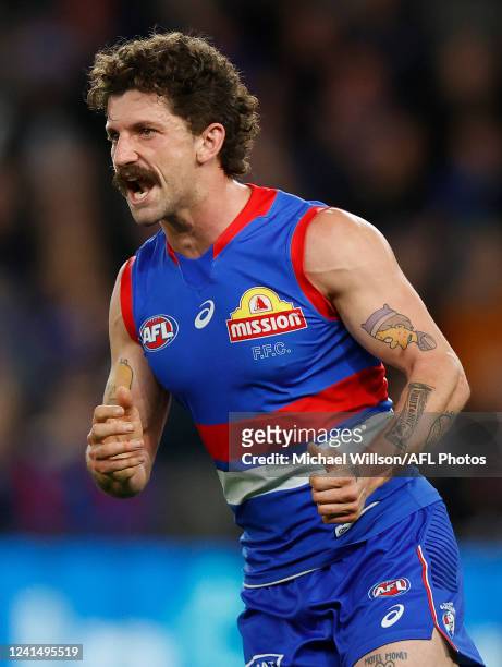 Tom Liberatore of the Bulldogs celebrates a goal during the 2022 AFL Round 15 match between the Western Bulldogs and the Hawthorn Hawks at Marvel...