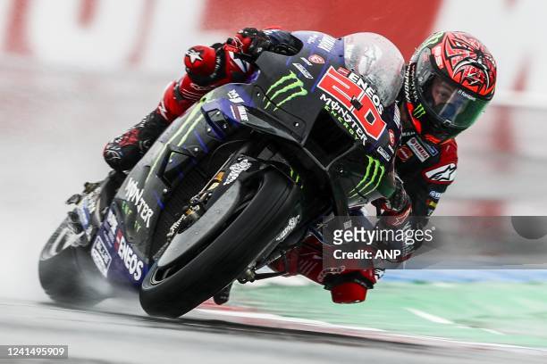 Fabio Quartararo on his Yamaha in action in the rain during the first free practice session of MotoGP on June 24, 2022 at the TT circuit of Assen,...